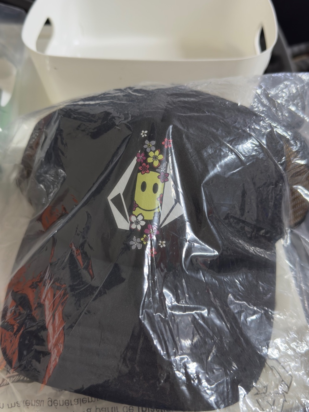 Volcom Black Hat with Yellow Floral Smiley Graphic